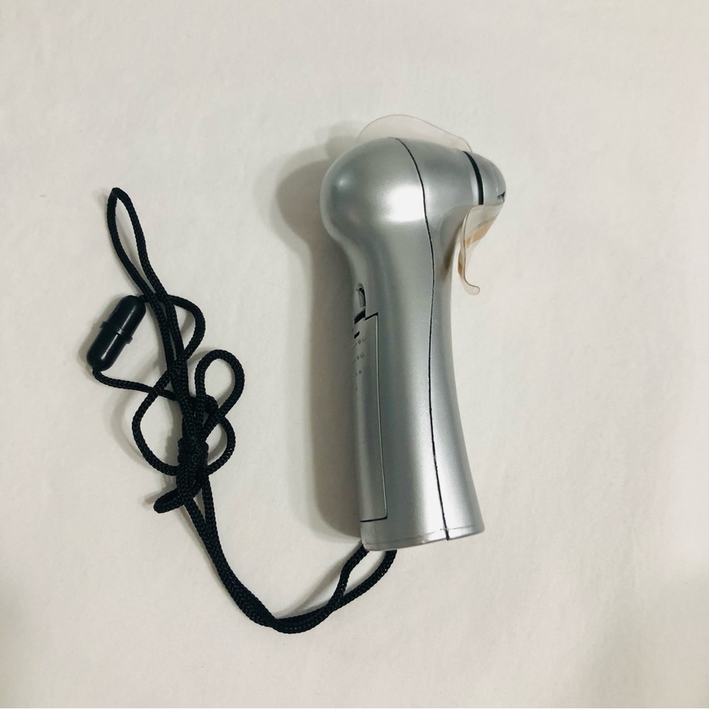 Silver portable mini fan with drawstrings attached